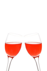 two glasses with a drink together, isolated 