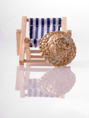 straw hat and beach chairs