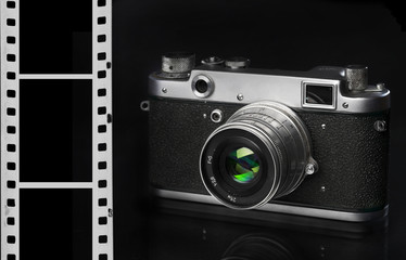 Old camera with an empty film sideways