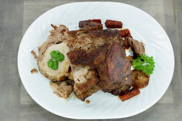 Roasted pork meat in dish ready to be served.