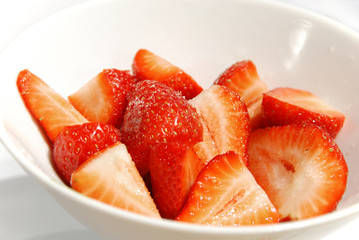 delicious bowl of fresh strawberries with sugar