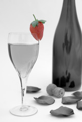 Strawberry on a champagne glass selectively colored