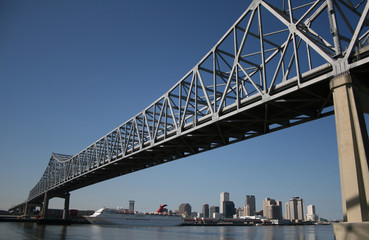 bridge with New Orleans skyline