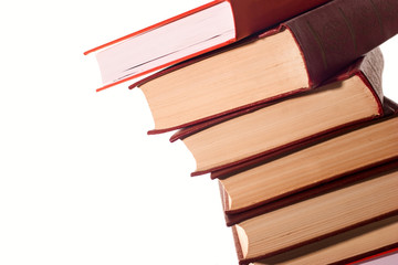 Stack of books over white