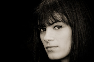Fototapeta premium Woman portrait in darkness.