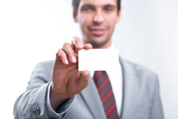 Man in suit with visiting card