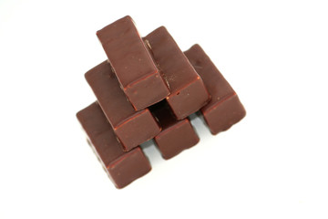 pyramid of chocolate blocks isolated on white