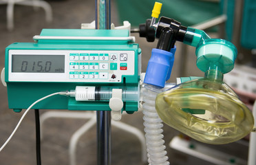 anesthesiologist's working tools: syringe pump and mask
