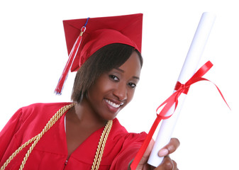 A pretty woman holding her diploma at graduation