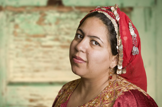 Portrait of a Muslim Woman in an Ornate Head Scarf