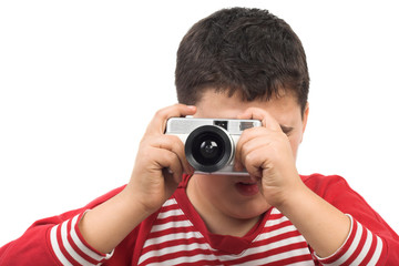 Fototapeta premium young boy taking a picture
