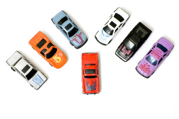 Seven models of cars on white background