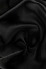 Majestic black silk textile background.  - 5859071