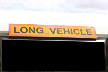 Obraz premium signs for long vehicle and a blank sign