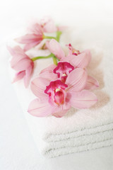 White towels with orchids