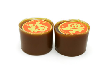 Chinese New Year sticky rice cakes on white background