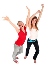 Young women with arms raised 