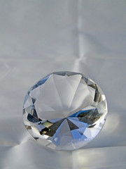 large sparkling diamond against a white background