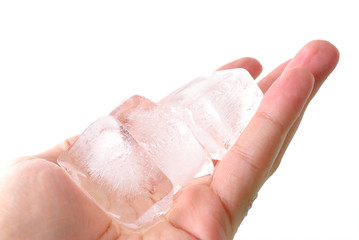 Hands holding ice cube for some drink .