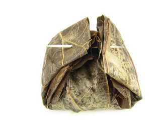 Closeup of isolated Steamed Rice in Lotus Leaves (Chinese Food)