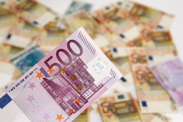 five hundred euro banknote on background of money