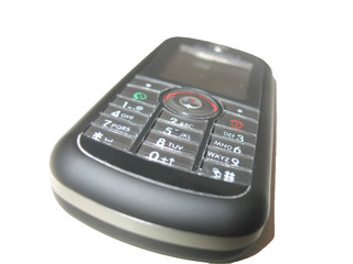 Obraz premium Mobile phone placed on white background.