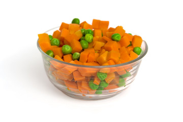 Orange carrot and green peas boiled and mixed