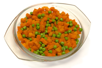 Orange carrot and green peas boiled and mixed