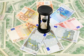 sand-glass on the money