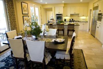 Kitchen with a tile floor and breakfast table.