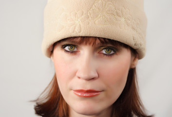 woman with beige hat