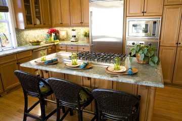 Luxury kitchen with a modern granite island.