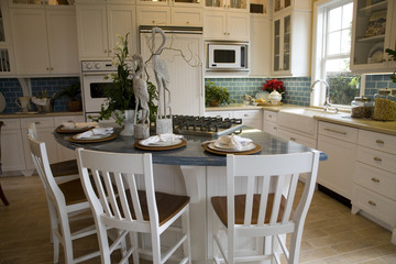 Fototapeta na wymiar Luxury kitchen with a granite breakfast counter.