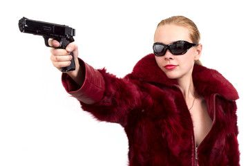 The blonde with a pistol in a hand