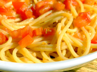 Macro of spaghetti with tomato sauce
