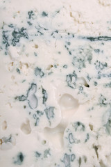 Fototapeta na wymiar Stilton cheese, close-up. A unique texture