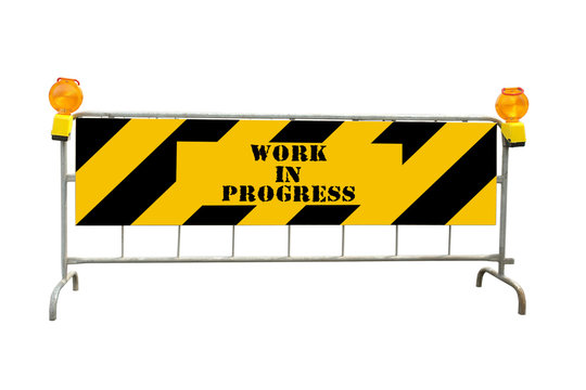 Black and yellow striped road construction barrier