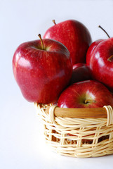 red appels in basket
