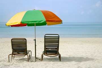 colorful umbrella on sand beach