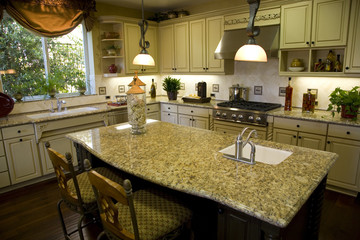 Luxury kitchen with a modern granite island.