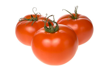 Three fresh tomatoes isolated