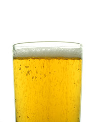 Top of a glass of lager wth white head