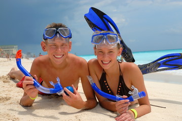 Happy snorkeling teenagers