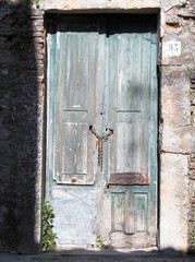 old and worn door of a abandoned house