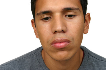 Young Hispanic Man Sad