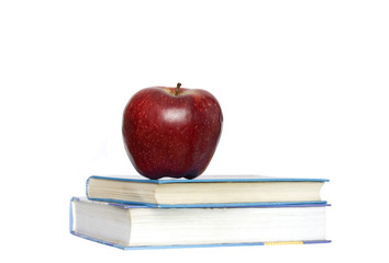 Red apple and stack of books 
