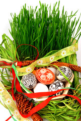 Still life with easter eggs and fresh grass