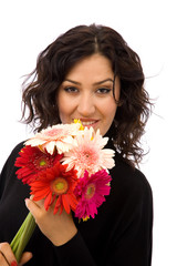 beautiful girl with colorful flowers on white background