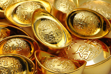 Close up of chinese gold ingot ornaments