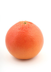 close up of a fresh red grapefruit on white background